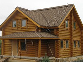 Фотография двухэтажного деревянного дома