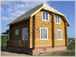 Фотография двухэтажного деревянного дома